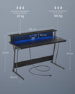 Skrivbord med monitorstativ – 135 cm – svart